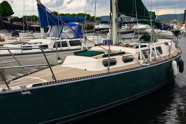 The 9.2's deck layout is well-executed with proper attention to details like anchor wells, bow fittings and halyard runs. Note the somewhat narrow walkways for getting forward and the considerable step up required for the center cockpit version. Photo courtesy of Boats.com