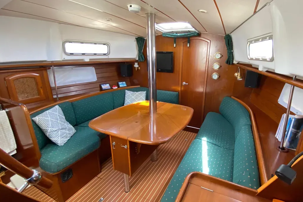 Despite her 36-foot length, the Oceanis 36 CC offers standing headroom of 6 ft. 1 in. throughout most of the interior. The forward cabin's platform berth measures 6 ft. 4 in., though it tapers toward the bow—adequate for most cruising couples. Courtesy of Yachtworld.com