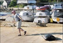 Practical Sailor drops, drags, and dissects three flexible potable-water tanks.