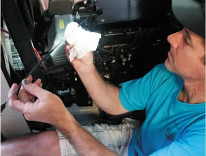 When you are collecting an oil sample from a diesel engine, make sure you create a uniform drop size and warm the engine first. (Photo/ Drew Frye)