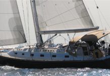 Cruising amenities like the bimini top and stern-mounted radar dome shown here add windage, which can hamper performance—especially when sailing to weather. However, for most cruisers, the comfort and utility these features provide are worth the slight penalty in boat speed.