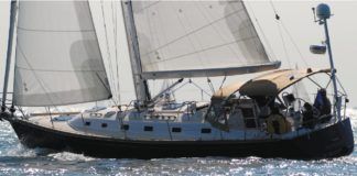 Cruising amenities like the bimini top and stern-mounted radar dome shown here add windage, which can hamper performance—especially when sailing to weather. However, for most cruisers, the comfort and utility these features provide are worth the slight penalty in boat speed.