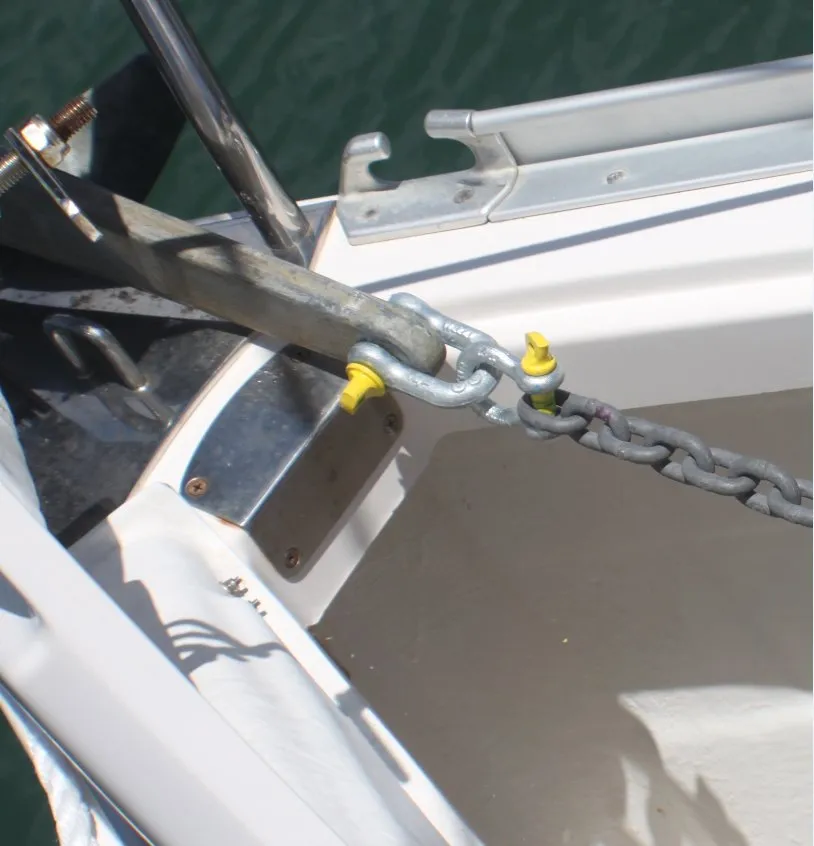 Pairing a small-diameter chain with a big anchor often requires using two shackles. This setup shows (from left) a 56-pound (25-kilogram) Manson Ray anchor, a 1/2-inch Titan D shackle, a 3/8-inch Titan bow shackle, and 10-millimeter G30 chain.