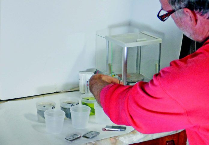 We placed standard samples of aluminum, steel and brass in a separate container of each solution to measure corrosion over time. The samples were weighed to the nearest milligram before testing began, and then at two hour intervals.