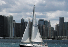 The Chicago skyline make for fun, gusty sailing. A favorite land- mark is the MV Abegweit, the 372-foot long icebreaker that is home to the Columbia Yacht Club.