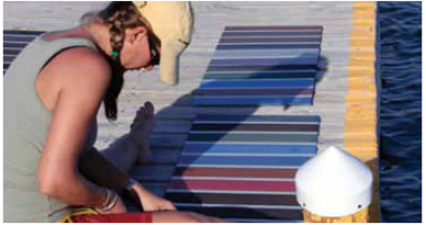 New panels are prepared for launching on Sarasota Bay