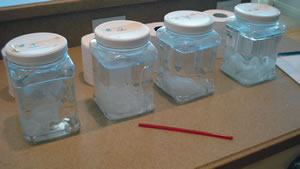Tissue paper put into plastic jars 