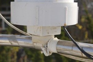 The PVC base cap screws on.