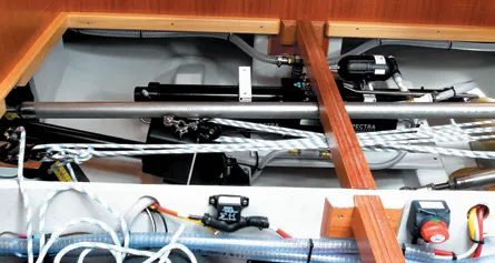 1. Adding block and tackle emergency steering to a crowded compartment located under the aft cabin berth makes boat handling difficult for a helmsperson who can’t see where they are going.