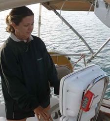 The Cerberus (seized to the binnacle) was able to transmit and receive without problem under the cover of a Bimini. 