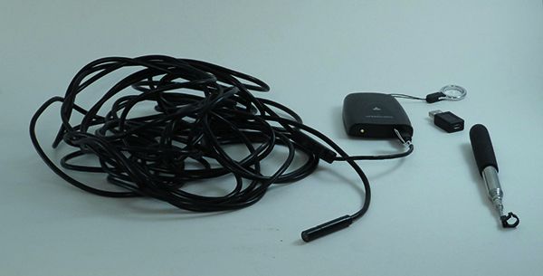 6. endoscope kit, including remote battery and transmitter pack and extension kit. Less cable would be better