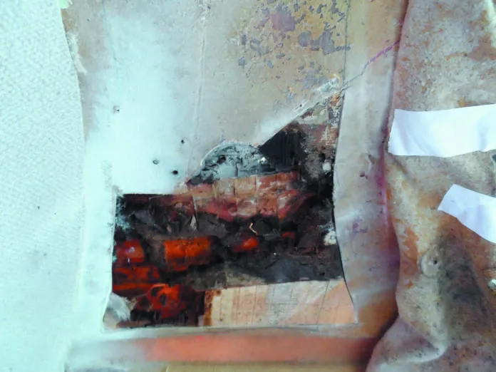 2a. Determining the limits of removal. notice the plywood insert at the upper edge and the good balsa at the lower edge