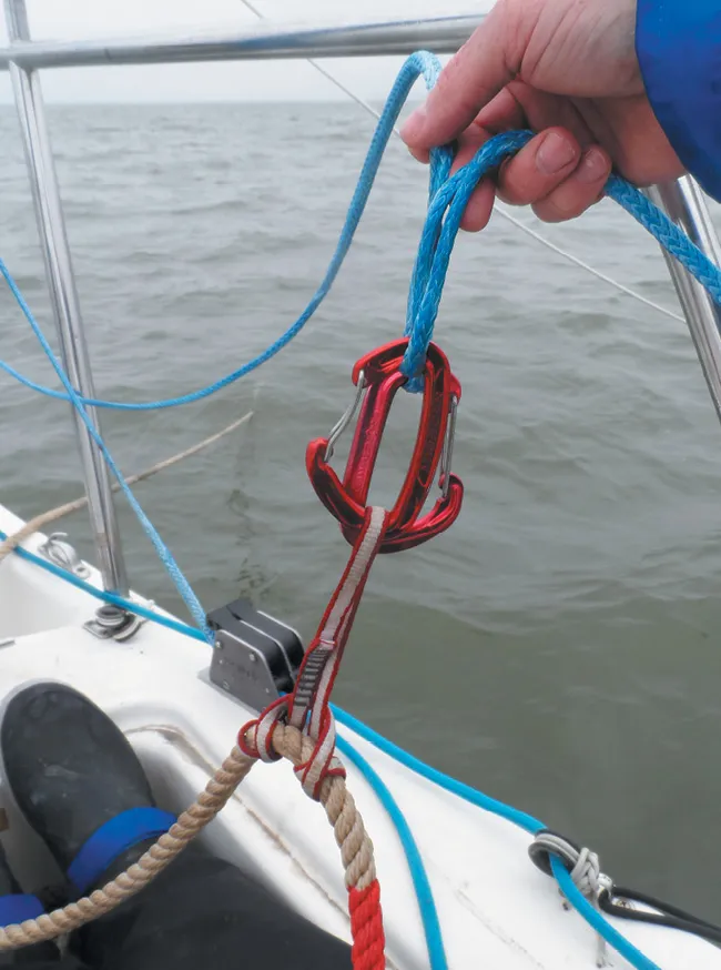 You can use a low-stretch Dyneema anchor snubber with nylon rode since the nylon stretches to absorb shock loads.
