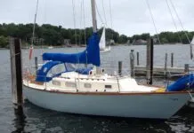 small sailboat with outboard motor