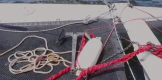 Your get-home jury-rig won't be pretty. It consists of a bridle line (spinnaker sheet works nicely), a length of chain to keep the drogue submerged, and a series of fenders to aid recovery.