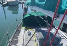 A helpful view of the jackline leading around the dodger to a hard point on top of the coach roof, and from there forward to the base of the mast.