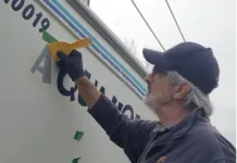 With a few inexpensive materials and a bit of patience, you can redo the vinyl lettering on your boat yourself. (Photo/ Marc Robic)