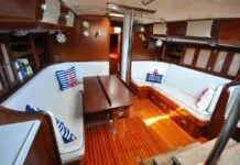 The Hinckley 49 comes in four different cabin layouts, but all feature mahogany or ash, with no bare fiberglass visible. Photo courtesy of Yacht World.