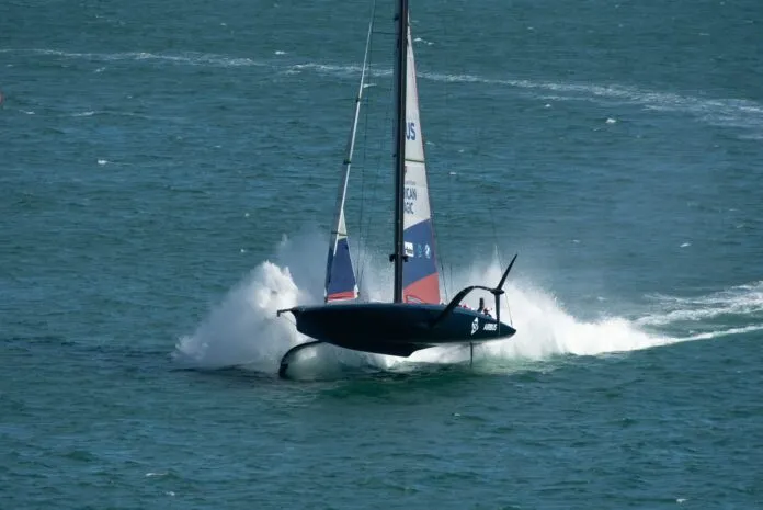 Waitemata,Harbour,,Auckland,,New,Zealand,-,January,29,2021:,American America's Cup sailboats have progressed from deep-keel monohull J-class Yachts, to regal Twelve Meters, to rambunctious wing-sailed catamarans. The rule now restricts boats to a single hull, but allows retractable, hydraulically actuated foils. Top speeds of 40 knots are common. (Photo/Shutterstock)