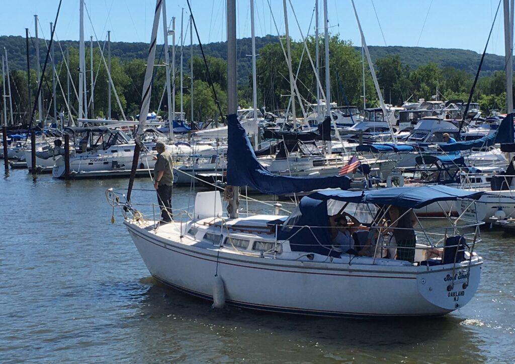 Dad on the bow in Safe Harbor Haverstraw Marina in NY on the Hudson River. In this picture we are going for a cruise in July—we primarily sail these waters, no coastal cruising for Rock Steady. (Photo/ Kim Saylor)