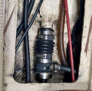 After the traditional stuffing box failure, we decided to get this dripless stuffing box installed by a diesel mechanic. So far, the maintenance has been relatively easy; we check the fittings, clamps and bellows each season. (Photo/ Kim Saylor)