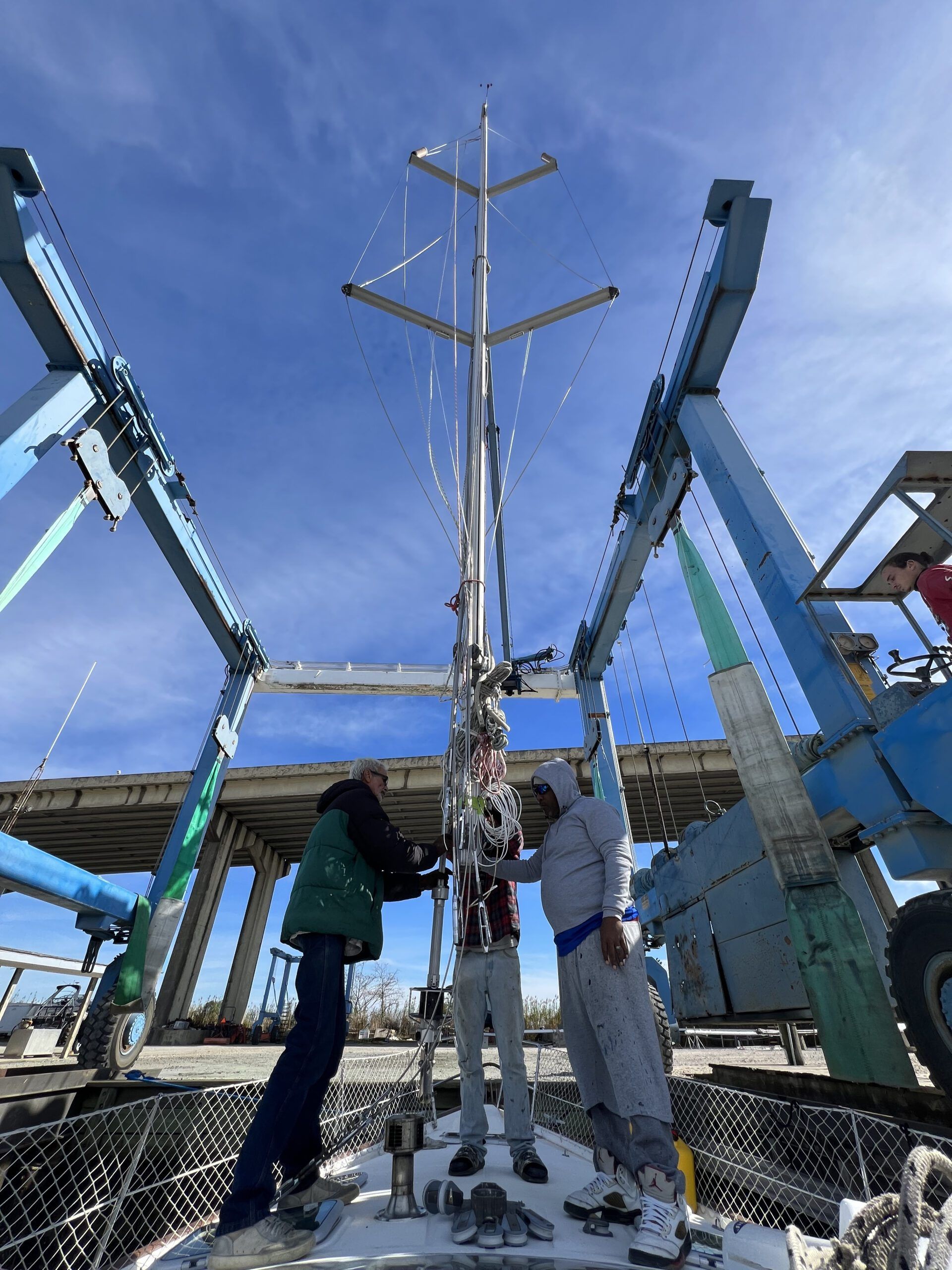 We put the mast back up in Mobile, AL at Turner Marine. We were excited to become a sailboat again! (Photo/ Alison Major)