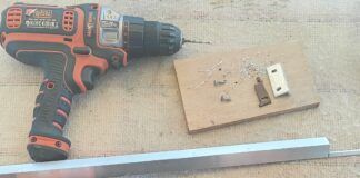 Replacement door latch made from an off-cut aluminum angle. The crafty DIY repair was made in the remote archipelago of Saint Pierre et Miquelon, where no hinges were readily available. (Photo/ Brett Campbell)