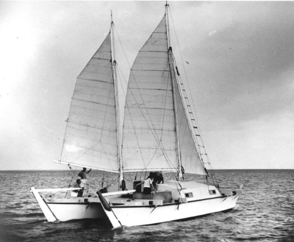 The 1957 built, 40-ft. wooden catamaran Rongo on its first sail in Trinidad. Courtesy Wharram Designs. 