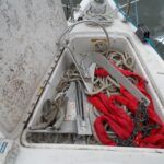 We like going one size over what is often recommended for smaller boats. The advantages are a.Less stretch. Nylon can be too stretchy, but polyester not stretchy enough. One size over can be a Goldilocks answer. b.Better wear resistance. Because we like using short chain when hand-hauling, we cover the first 10 feet with a webbing chafe guard. This is very cut resistant, because unlike the rope inside, it is floating and not under tension. c. Better grip. ⅜-in. is pretty hard to grab with the wind is up. ½-in. fits our hands better. (Photo/ Drew Frye)