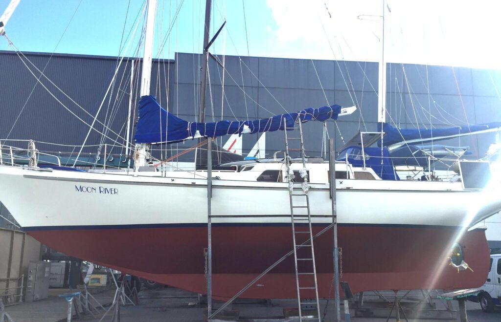 Moon River on the hard for annual maintenance, antifoul and a CAT1 out of the water inspection. This was in 2019, prior to our first offshore trip to the Pacific Islands. (Photo/ Carolyn Powles)