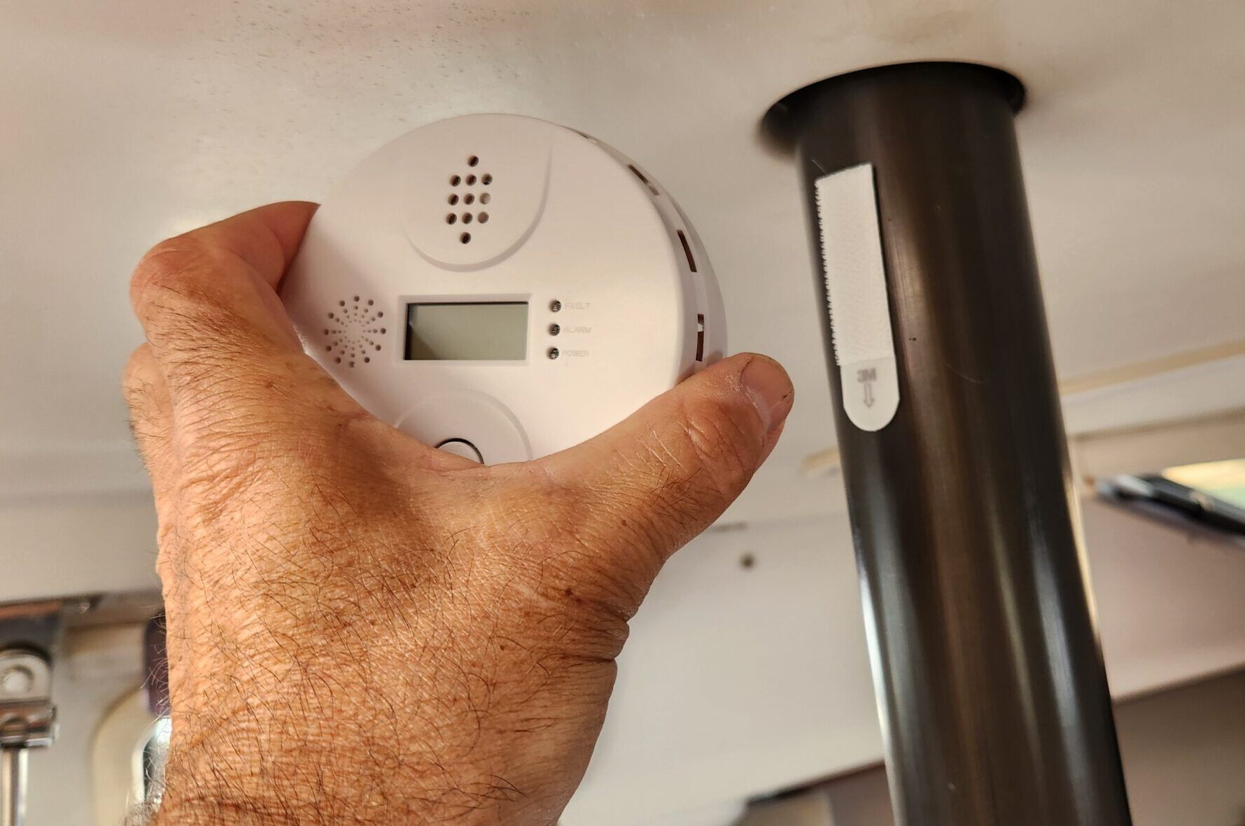Velcro strip secures the carbon monoxide sensor. No need to drill any holes. (Photo/ Marc Robic)