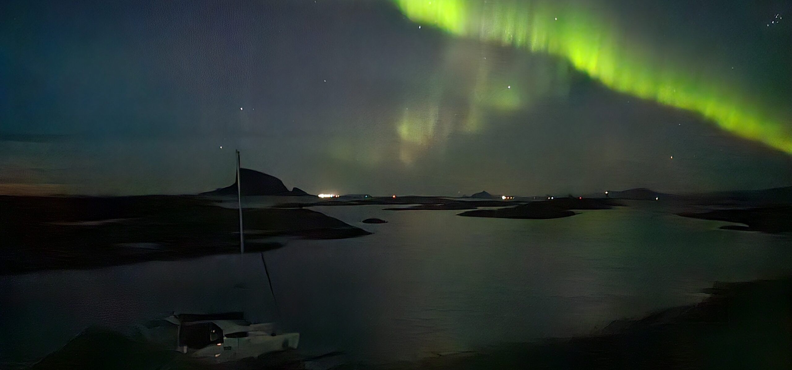 The aurora polaris glimmers above Haftor, offering the sailors magical evenings after long days of cleanup. (Photo/ Birger Haftor Nilsen and Ellen Gjertsen)