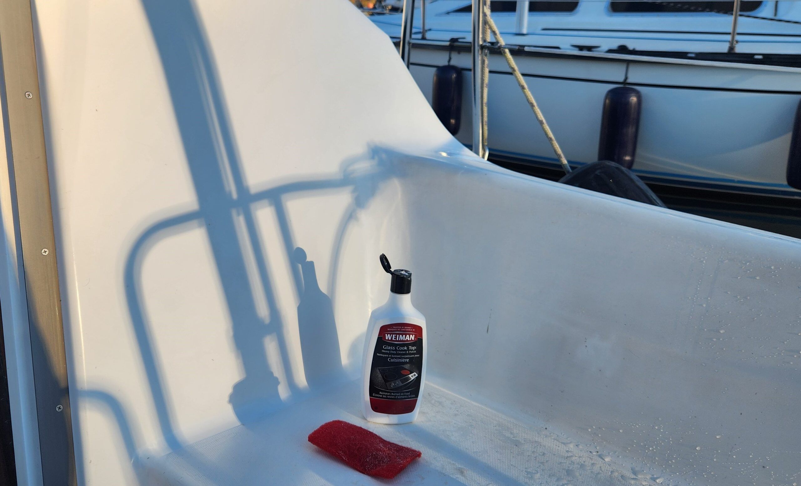 After scrubbing the yellowed gelcoat with the ceramic cooktop cleaner, its white shine reappeared. (Photo/ Marc Robic)