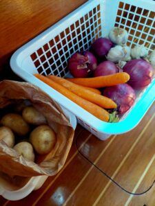 Baskets and paper bags are all the storage you need for root vegetables. Make sure to keep onions separate from potatoes, they can make each other rotten. (Photo/ Sarah Powell-Fowler)