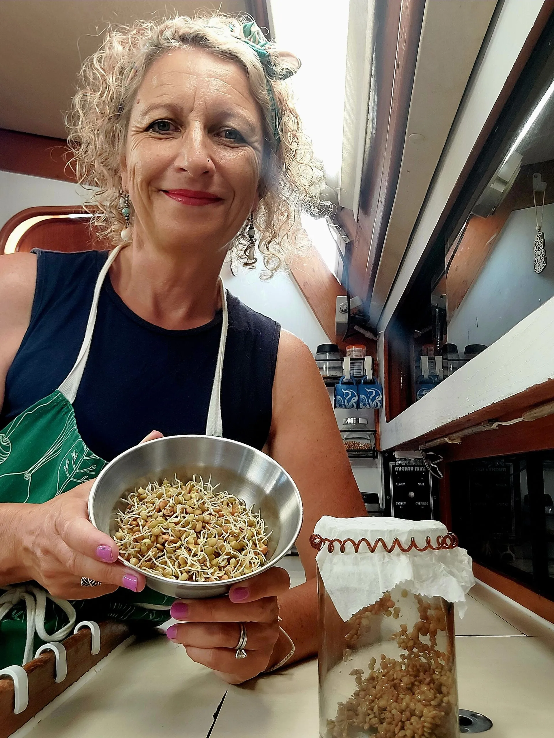 Sprouting legumes, like mung beans, is an excellent way to get that fresh veg crunch, even if you are at sea for weeks. Because the legumes are dried, they can be stored for much longer than fresh veg. After an overnight soak, drain the water from the legumes, then place the legumes in a covered, yet ventilated container, in a dark location for 12 hours to 3 days. When the white tail comes out of the legume, and is about 1 cm or a .5-in. long, it is sprouted and ready to eat. (Photo/ Sarah Powell-Fowler)