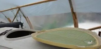 Up-close view of the hatch of an all-GRP boat being made from molds in Bretagne, France. (Photo/ Angie Richard)