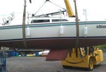 Haul Out Tips to Avoid Confusion and Delays The author's Catalina 270, Aquaholic, on slings. You can easily see where the slings are properly set. Even the crane seems happy! (Photo/ Marc Robic)