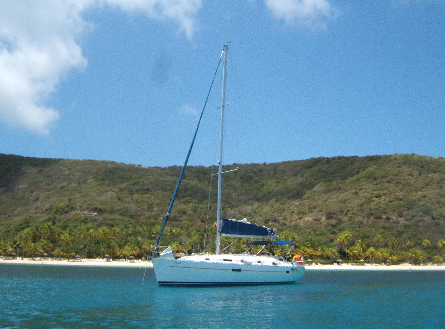 For trips where it's just the two of us, we are happy to charter a monohull. It is more affordable and has more than enough room. Our chartered Jeanneau 38 anchored in Deadman's Bay, Peter Island, British Virgin Islands. (Photo/ Marc Robic)