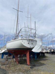 Rock Steady in the boatyard in spring. Yearly haul outs before winter do add to your costs, but it is also a great opportunity to do maintenance work. (Photo/ Kim Saylor)