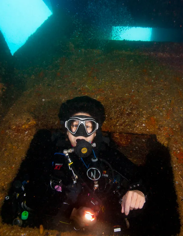 Diver, Zaide Scheib, swimming through a wreck in the northern Sea of Cortez. (Photo/ Eric Keibler)