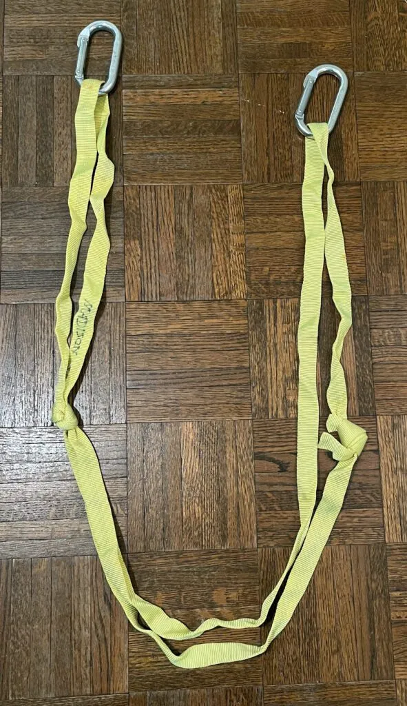 Photograph of Ann’s Madison Ladder. Note that you should use anodized or stainless-steel carabiners around salt water; otherwise, they gall. The ladder curls up so you can fit it easily into a pocket. (Photo/ Eric Keibler)