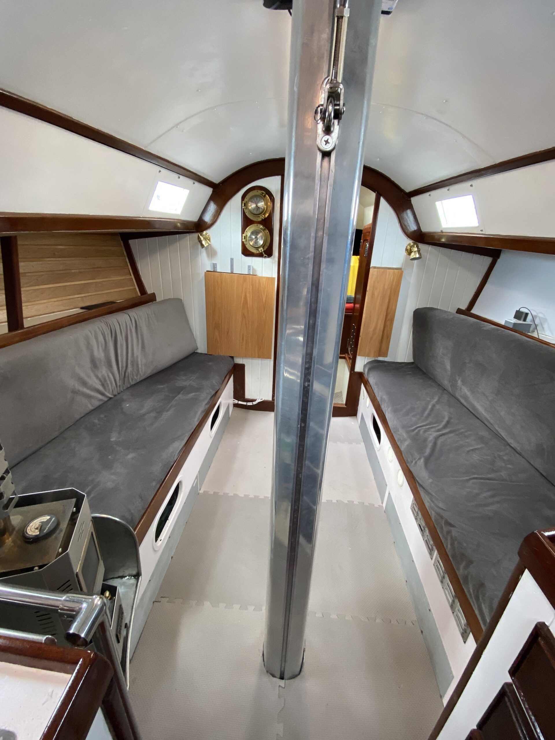 The previous owner-installed flooring, upholstery and prominently displayed inverter. (Photo/ Jaclyn Jeffrey)