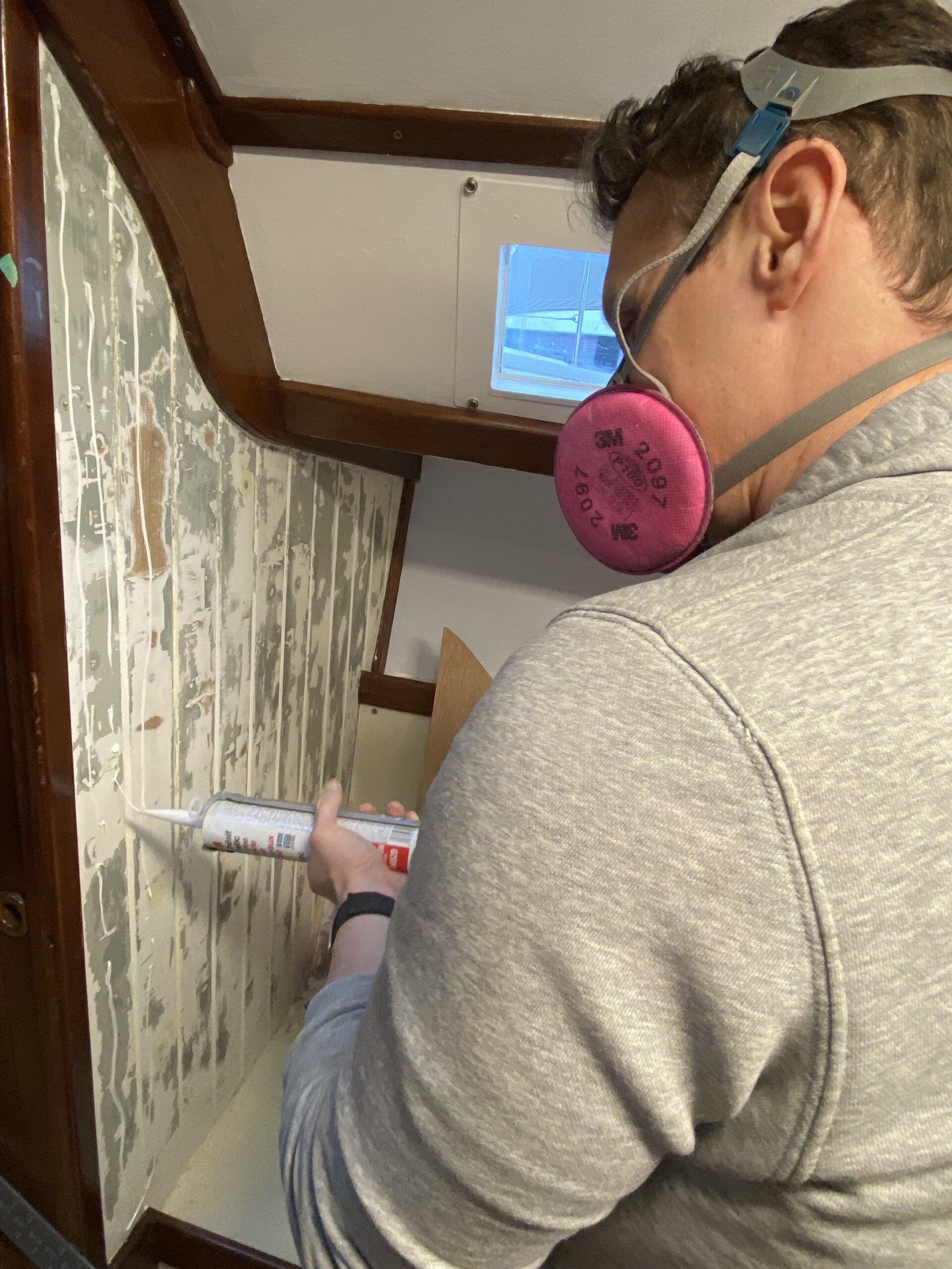Prepping the walls for veneer install. (Photo/ Jaclyn Jeffrey)