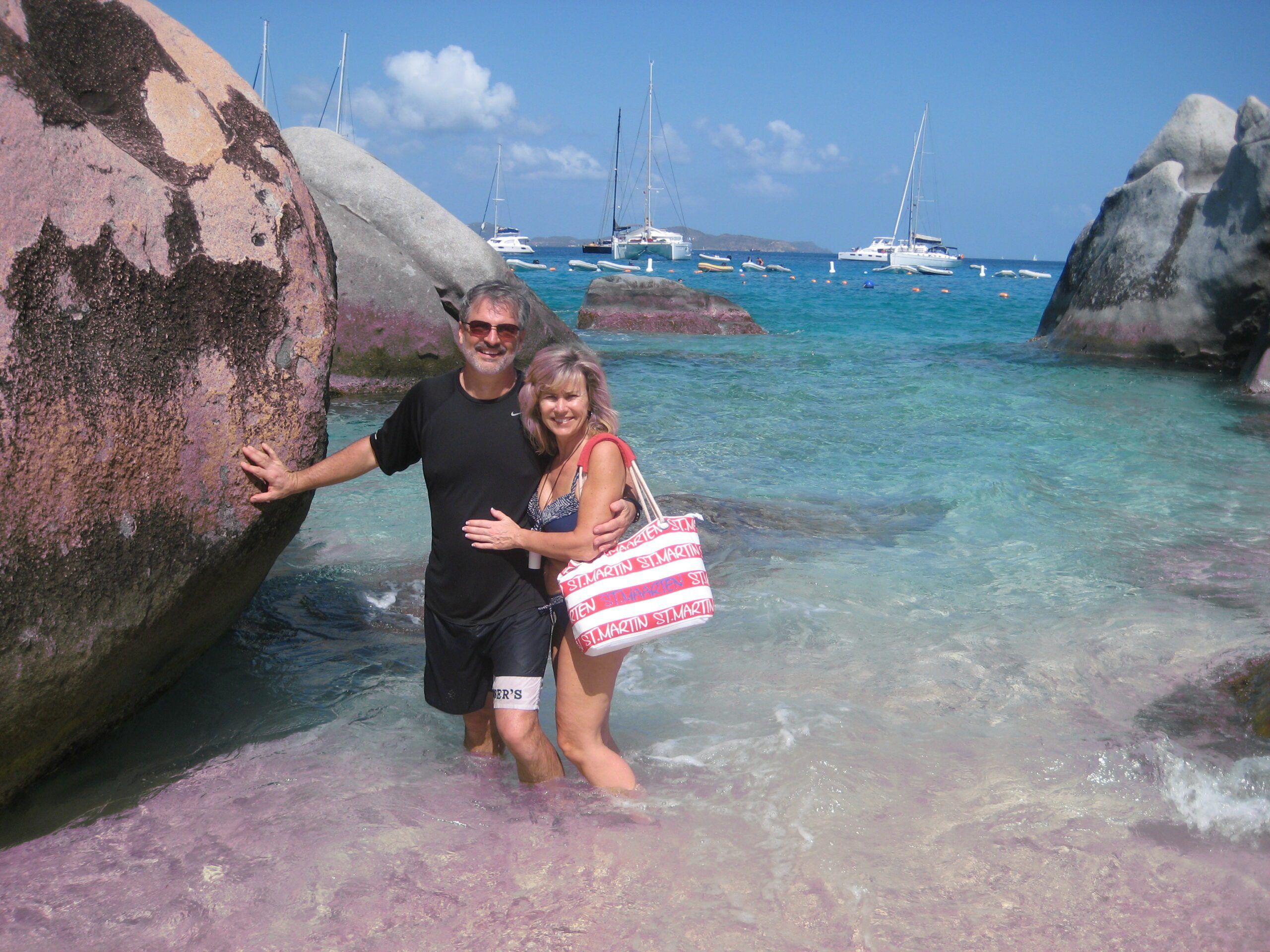 The Baths on Virgin Gorda with our boat, in the background, safely moored to a National Park mooring ball. (Photo/ Marc Robic)