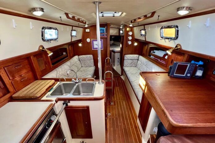 A welcoming sight for social hour, the 34's saloon is both comfortable and welcoming. Photo courtesy of Yacht World.