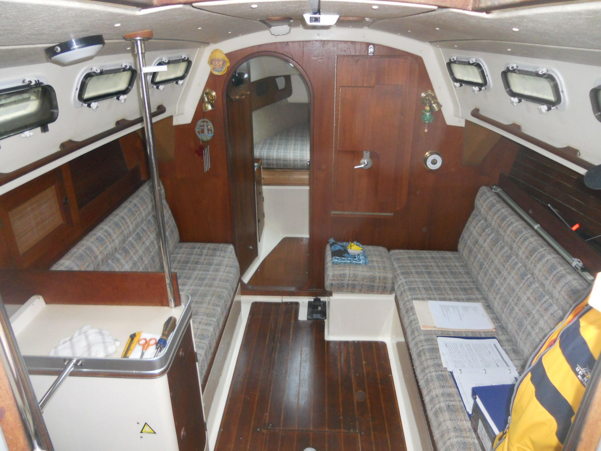 This 1985 CS 30 interior is a great example of how to present a vessel. Clean and decluttered. Note the maintenance books on the starboard settee. (Photo/ Ray Ville)