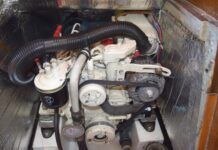 Alternator Overheat: A Surprising Solution for Older Boats Bilge hose connected to the air intake, sucking hot air from the alternator area. (Photo/ Bert Vermeer)