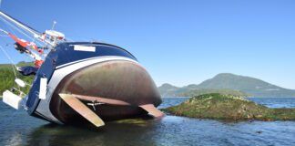 The captain made a navigational miscalculation so this 2005 Sabre 386 rested on a shelf just outside Cameleon Harbour in British Columbia for the tide to return. As a result of this temporary grounding, seagrass entered and blocked a through-hull. Identifying details have been omitted at the request of the captain. (Photo/ Bert Vermeer)