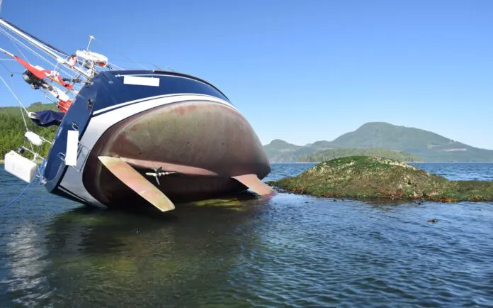 The captain made a navigational miscalculation so this 2005 Sabre 386 rested on a shelf just outside Cameleon Harbour in British Columbia for the tide to return. As a result of this temporary grounding, seagrass entered and blocked a through-hull. Identifying details have been omitted at the request of the captain. (Photo/ Bert Vermeer)