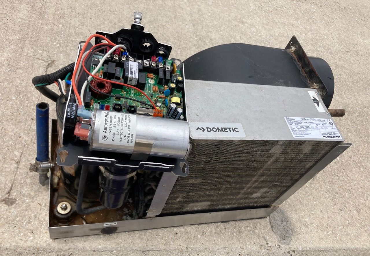 The old 16,000 BTU Dometic AC unit, removed after failure. (Photo/ Phil Decker)